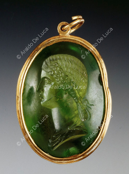 Medallion with bust of young woman in profile