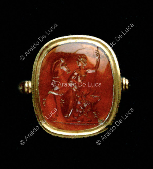 Ring with seated female figure and horse