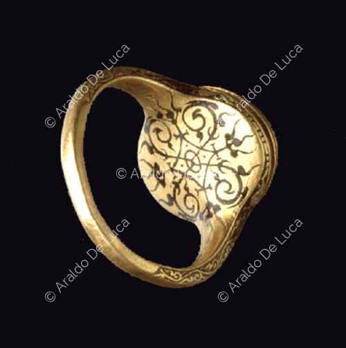 Ring with carved fly. Detail