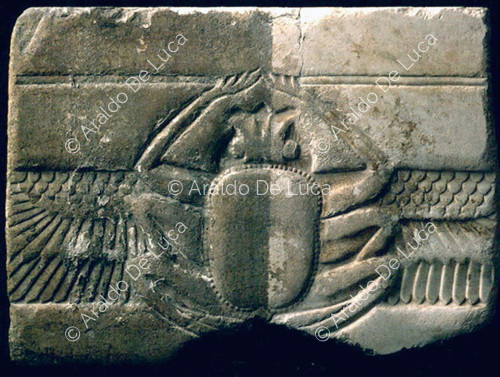 Architectural fragment decorated with a scarab