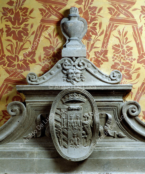 Fireplace. Detail with coat of arms