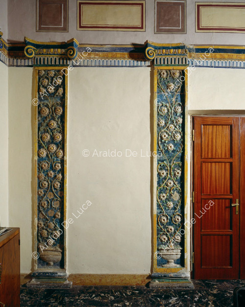 Decorated pilasters with flower vase