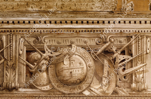 Monochrome frieze. Detail depicting weapons and armour