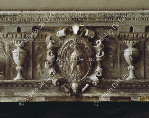 Fireplace with coat of arms. Detail