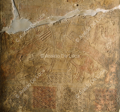Daunian stele with truncated head. Detail