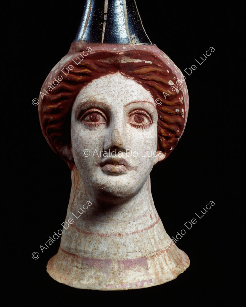 Polychrome vase in the shape of a female head