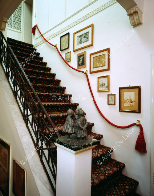 The collection of drawings on the stairs