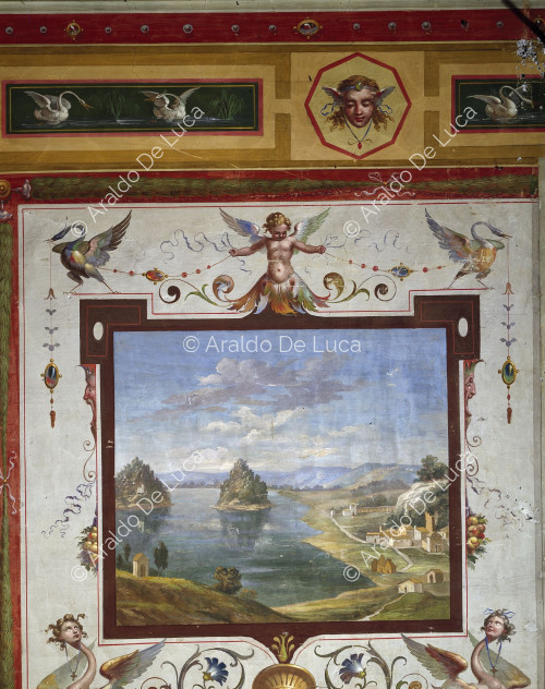 Detail of the wall with a view of Lake Vico