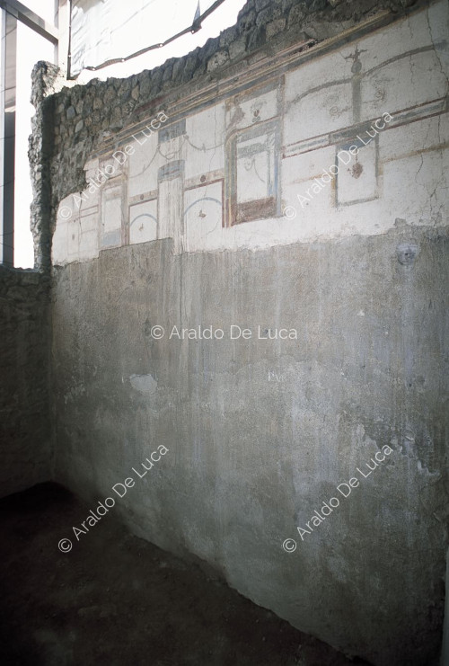 Maison du Sacellum Iliaque. Cabine avec fresque