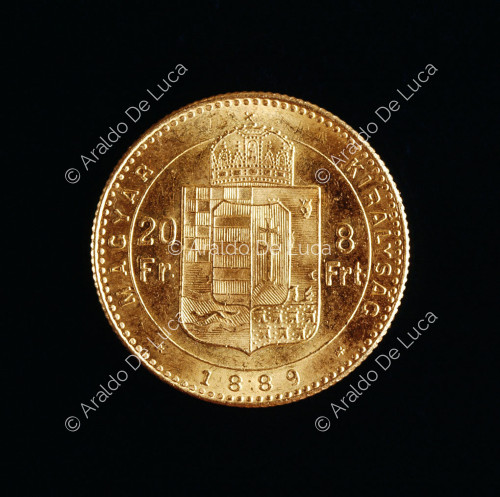Escudo de Hungría coronado por la corona de San Andrés, 8 florines austriacos o 20 francos de oro de Francisco José I de Austria