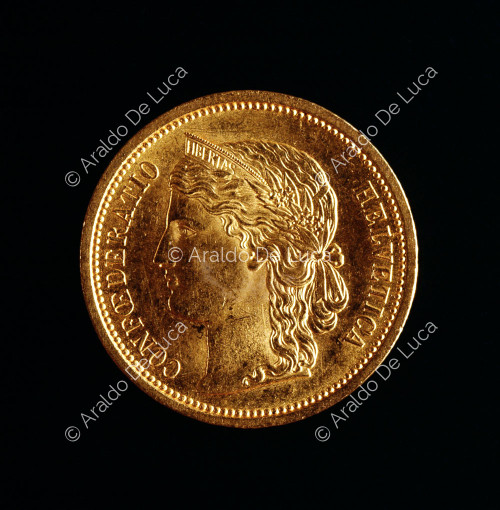 Laureate and diademed head of Liberty ,20 Swiss Francs in gold of the Swiss Confederation