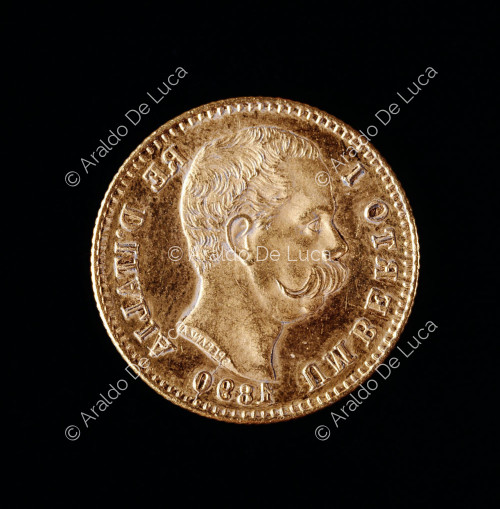 Bust of Umberto I ,20 lire gold marengo of Umberto I from the mint of Rome