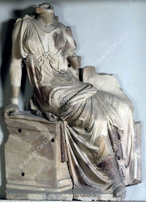Seated female figure