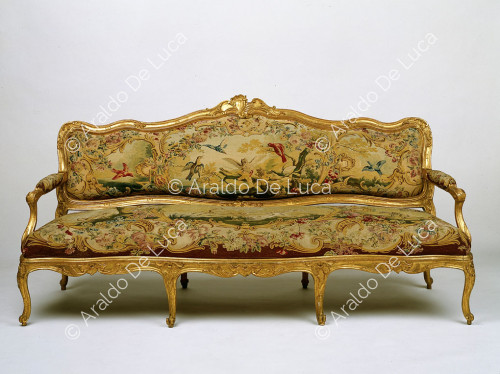 Sofa with shaped backrest and rocaille decoration