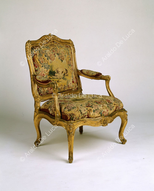 Armchair with rich floral decoration