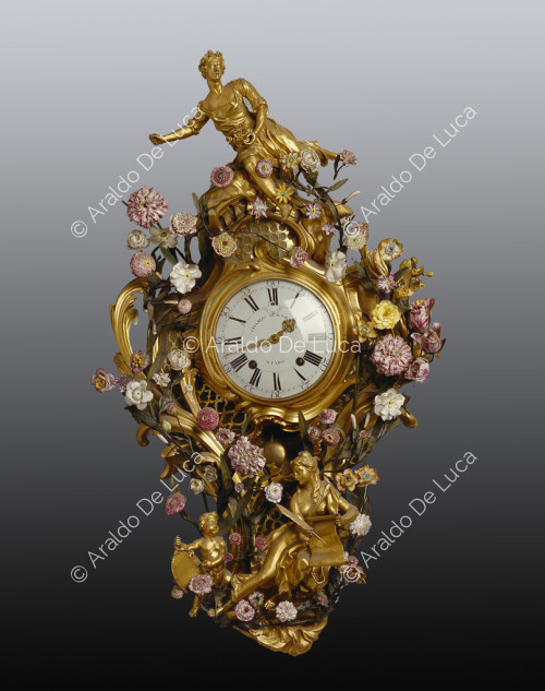 Clock surrounded by floral decorations
