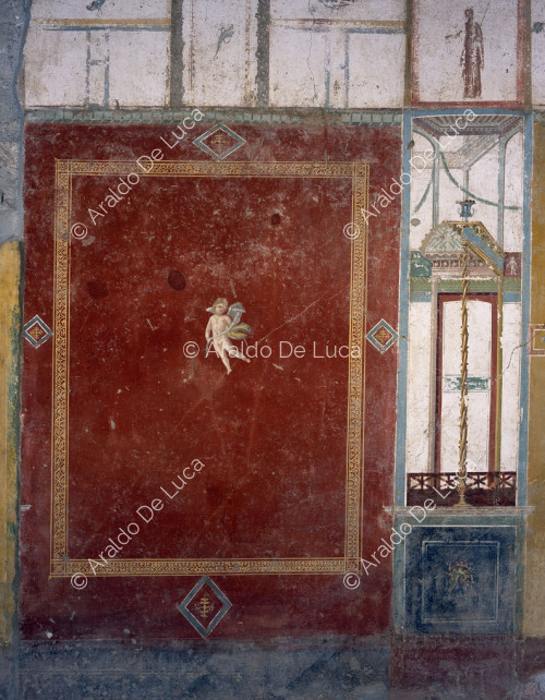 House of Pinarius Cerialis. Cubicle. Fresco with Cupid. Detail