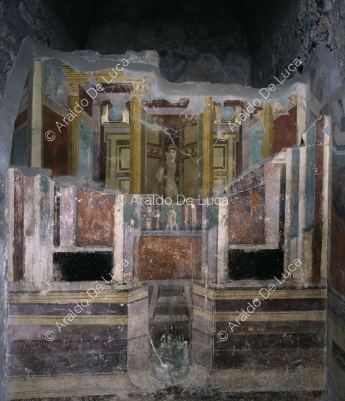Casa de Fabio Rufo. Cubículo decorado con frescos del Segundo Estilo. Pared central