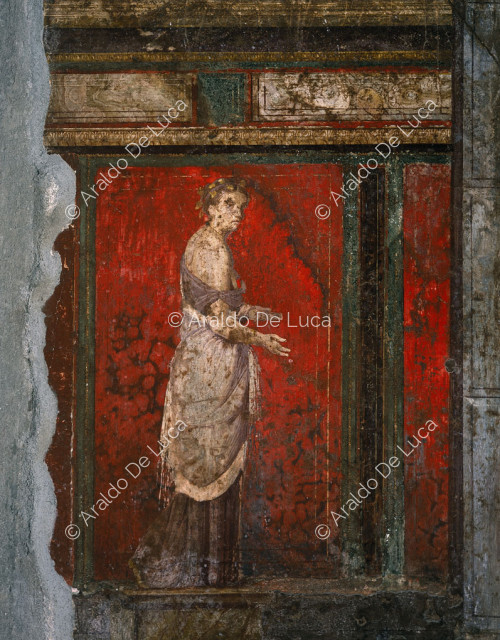 Biclinio. Fresken im Zweiten Stil. Detail mit Matrone