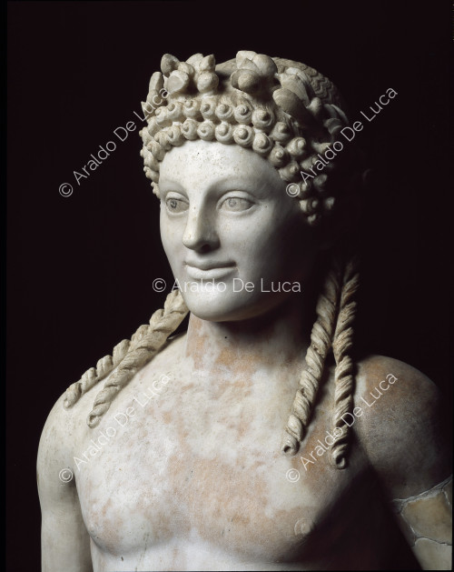 Marble statue of Apollo. Bust detail