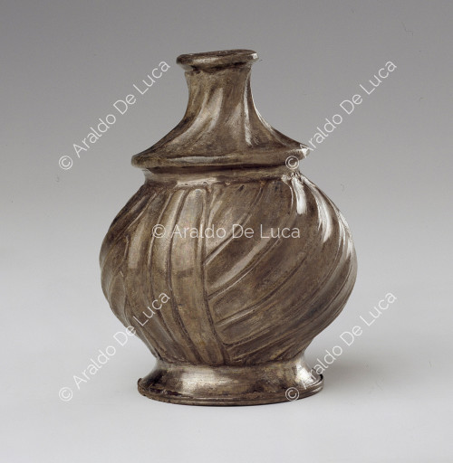 Silver cruet decorated with tortile motif