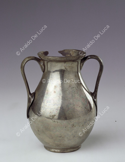 Silver jug with handles