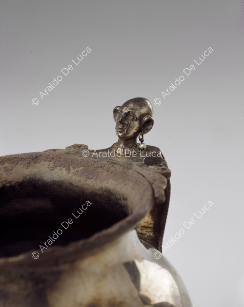 Silver jug with decorated handle. Detail of the handle