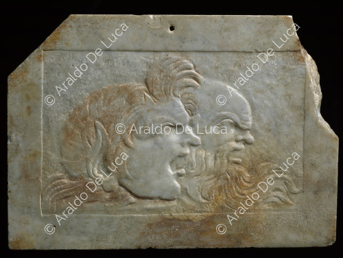 Marble relief with masks. Back side