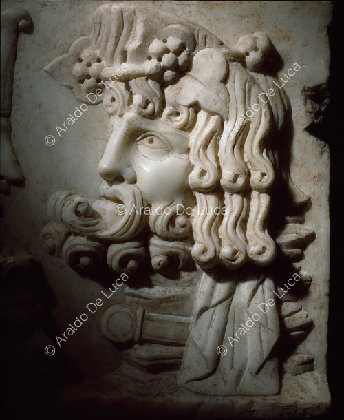 Marble relief with theatrical masks. Detail 