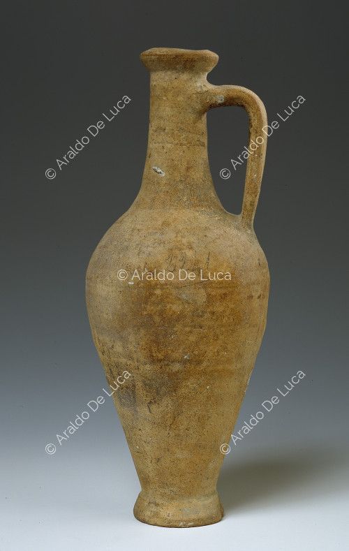 Clay jug with handle