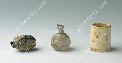 Cylindrical bone casket. Glass Aryballos. Acorn-shaped ointment jar