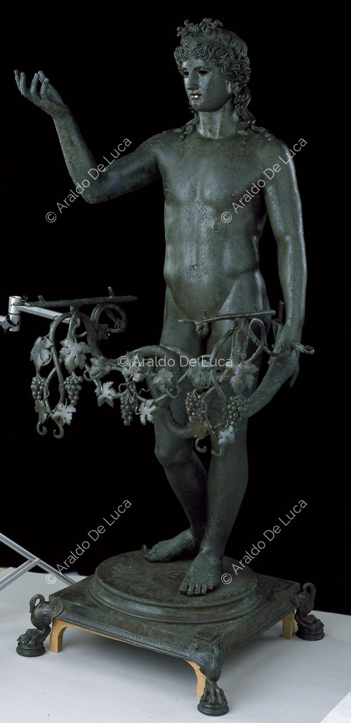 Bronze statue of naked Dionysus