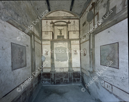 Casa de los Vettili. Cubiculo decorado con frescos en IV estilo