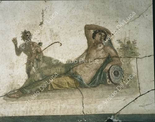 House of the Vettii. Triclinium in IV style. Fresco. Detail with Pan and Hermaphrodite
