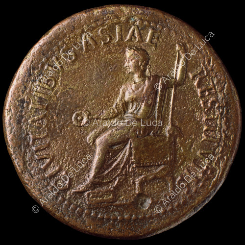Tiberius seated resting on a sceptre and patera