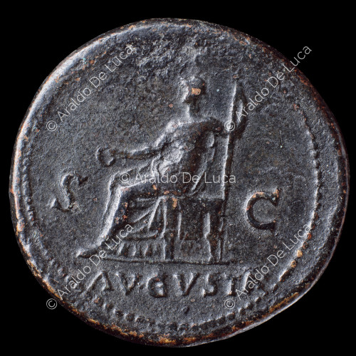 Livia seated on sceptre with patera