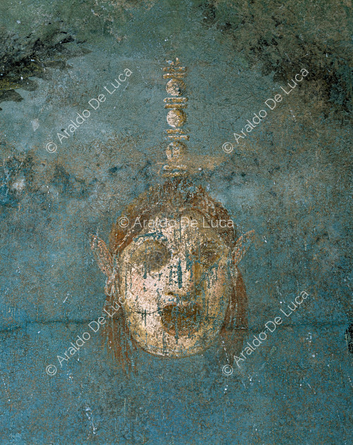 Haus der Blumenkästen oder Obstgarten. Blaue Kabine. Fresko. Detail mit Theatermaske