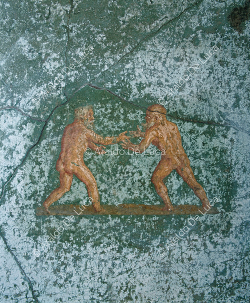 House of Menander. Calidarium. Fresco. Detail with wrestlers