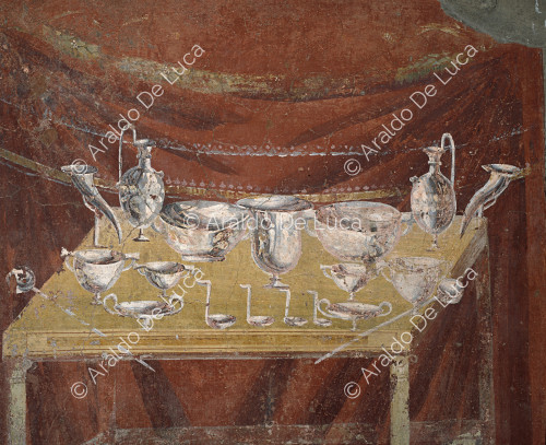Tomb of Vestorio Prisco. Fresco with pottery. Detail