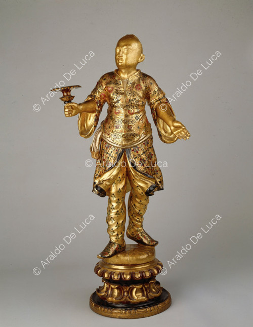Candleholder depicting a Chinese man
