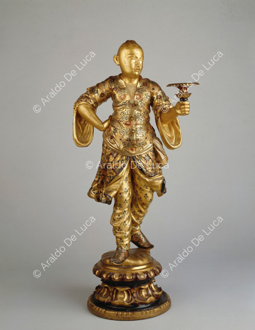 Candleholder depicting a Chinese man