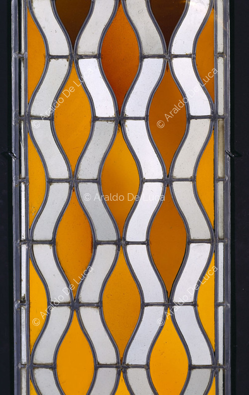 Stained glass window with geometric design