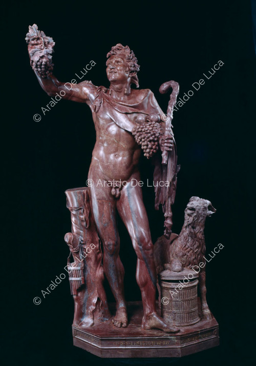 Statua di Fauno ebbro in rosso antico