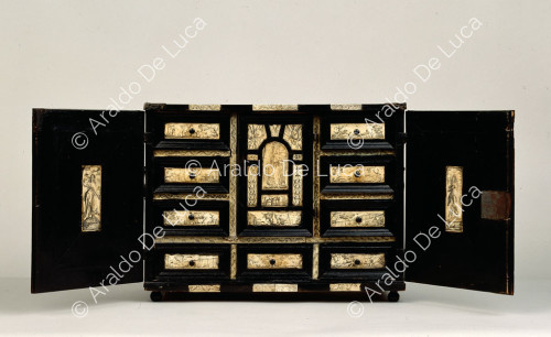 Ebony veneered cabinet with wooden parts