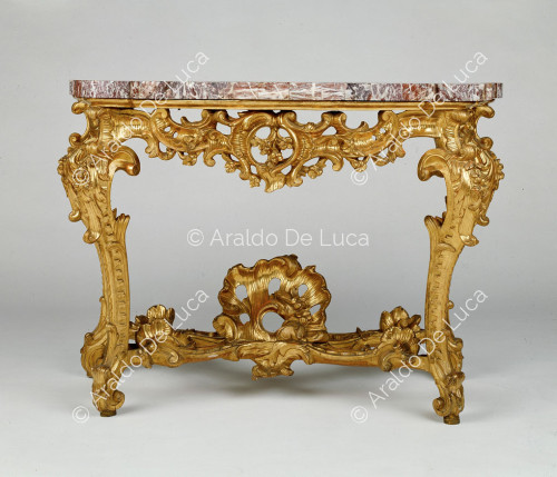 Tavolo in bronzo dorato con piano marmoreo