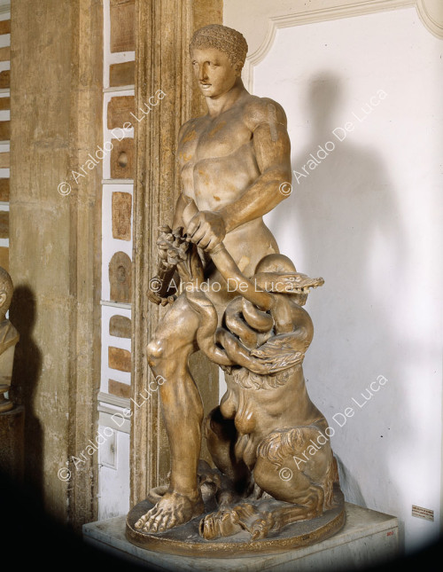 Statue of Hercules struggling with an animal