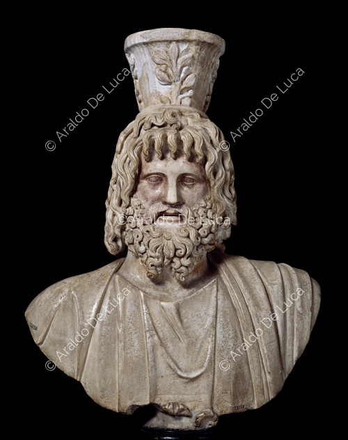 Bust of Serapis in white marble