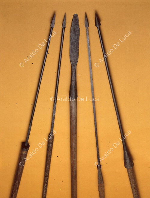 Four javelins and, in the centre, a spear
