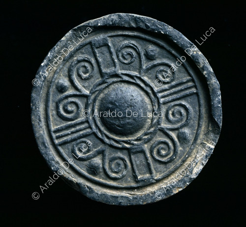 Terracotta army. Terminal of tile decorated with astral design