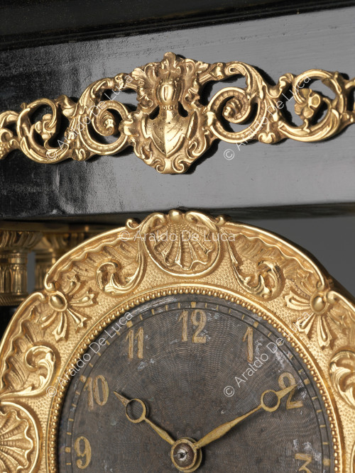 Porch table clock, detail of decorative pattern and clock face